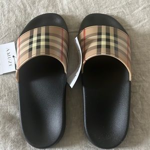 Burberry slides size 38 (US 7) never worn still in the box.